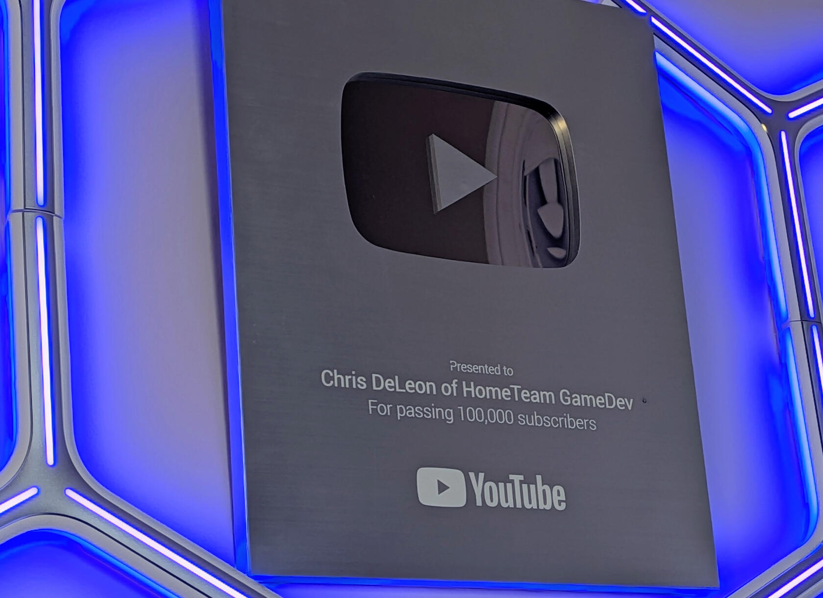 youtube silver award for 100k subscribers chris deleon of hometeam gamedev.